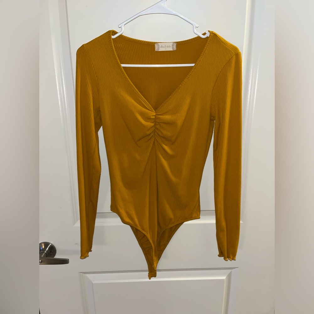 Mustard colored yellow bodysuit! NEVER WORN